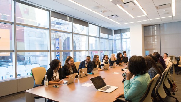 Adults in a meeting room
