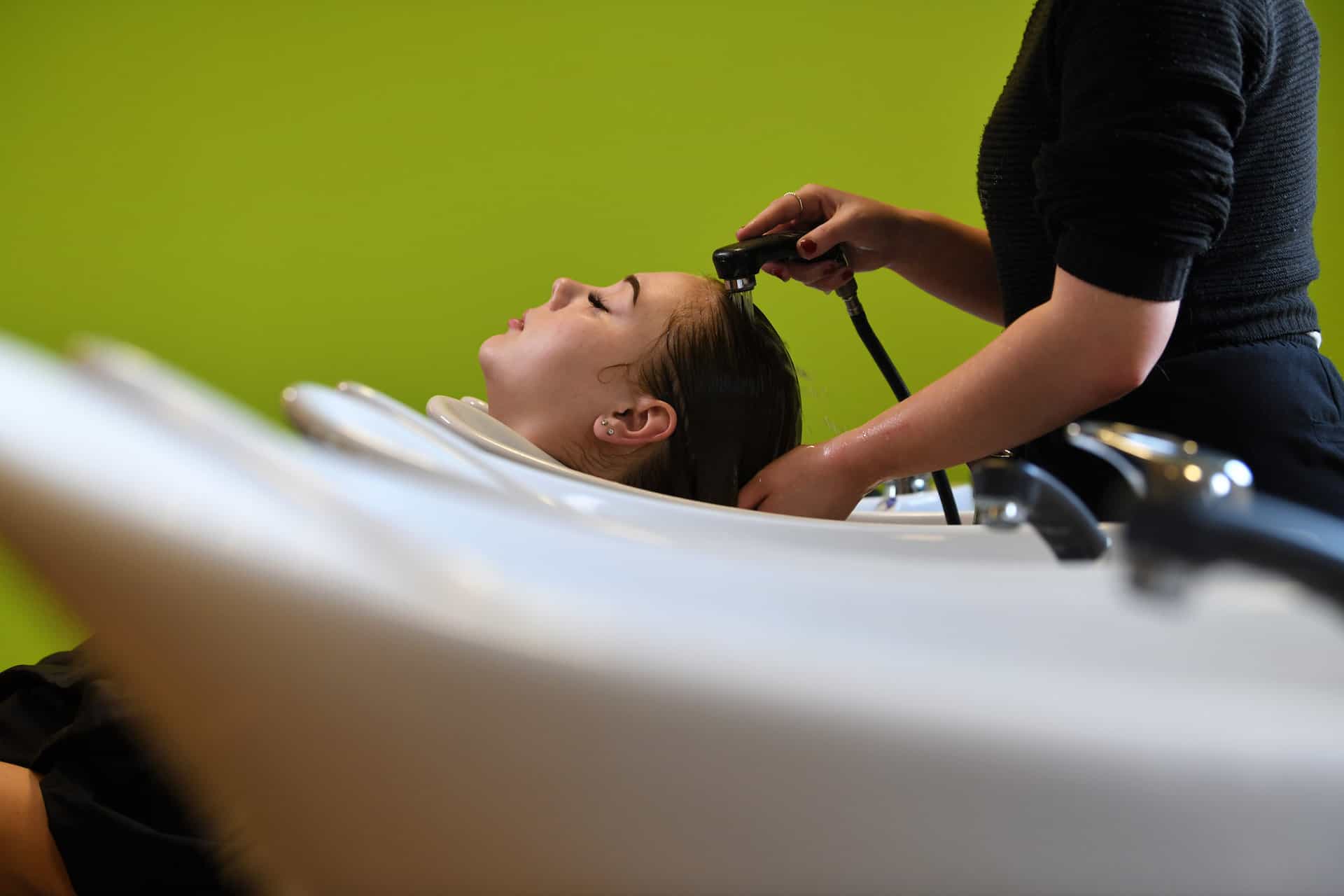 A client having a hair wash at the Aura Salon