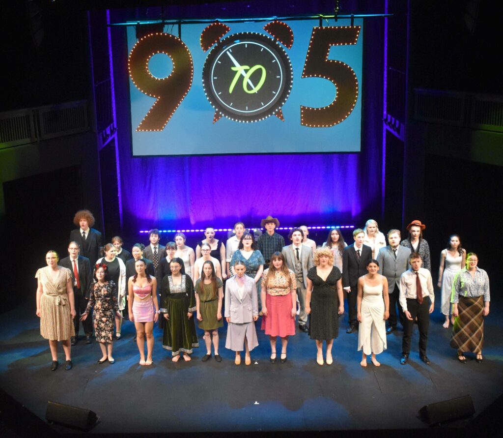 College students performing 9 to 5 at the wolsey theatre