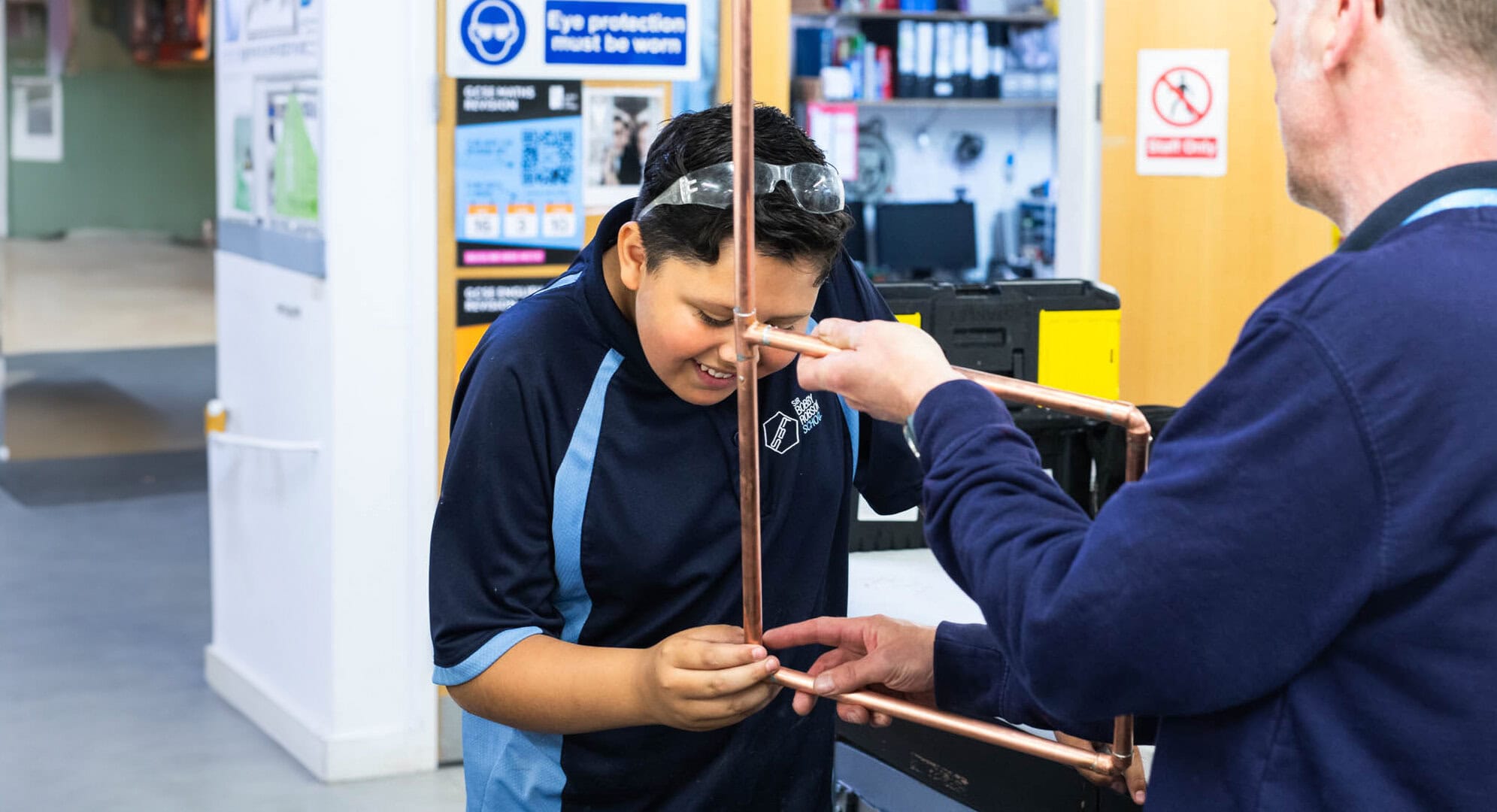 Year 9 pupil in plumbing workshop