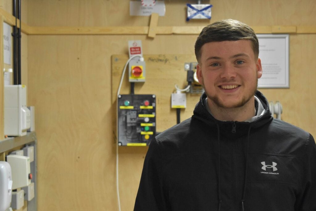 Zack in the SNC electrical workshop