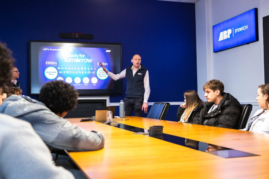 Learners being given a presentation by ABP business leaders