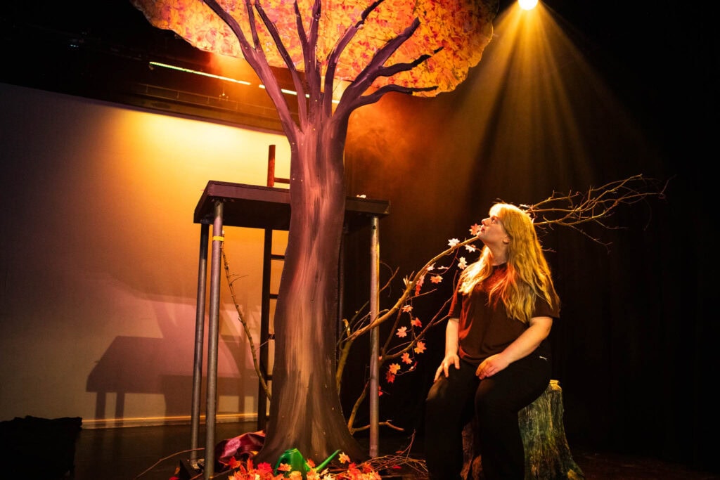 learners performing on stage